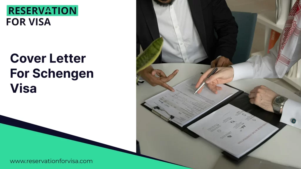 Close-up of two people at a desk reviewing and pointing to professional documents. The person on the right is wearing traditional Middle Eastern attire.