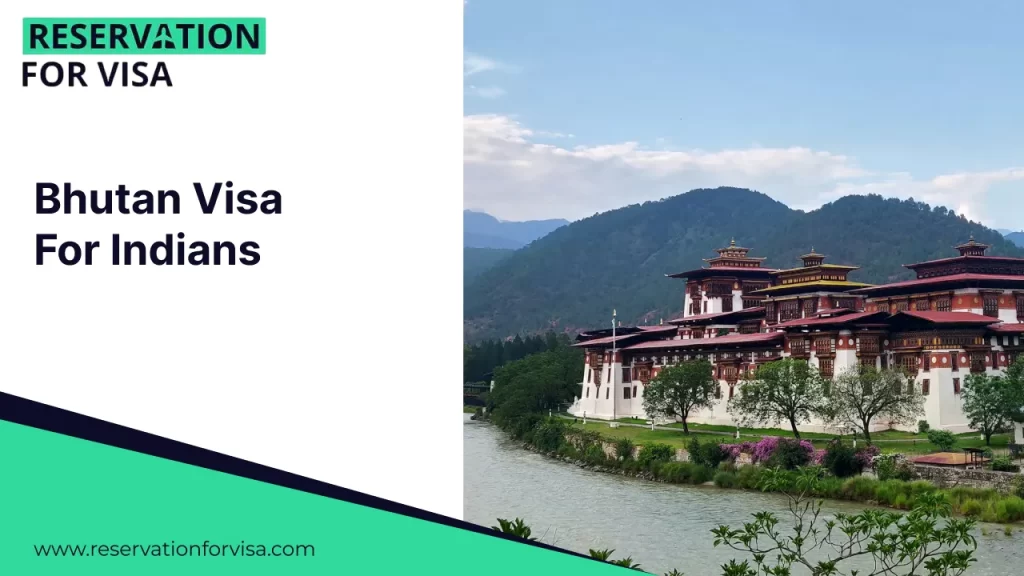 A grand Bhutanese dzong (monastery-fortress) with traditional red and white architecture situated along a riverbank with lush mountains in the background.