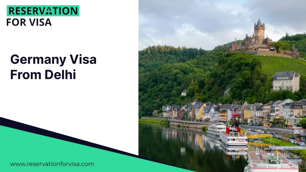 Germany Visa From Delhi A picturesque riverfront view in Germany featuring colorful buildings and excursion boats, with a historic castle perched on a lush green hill in the background.